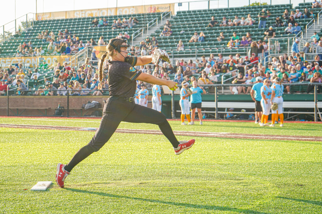 Madison Night Mares player winds up to pitch the ball.
